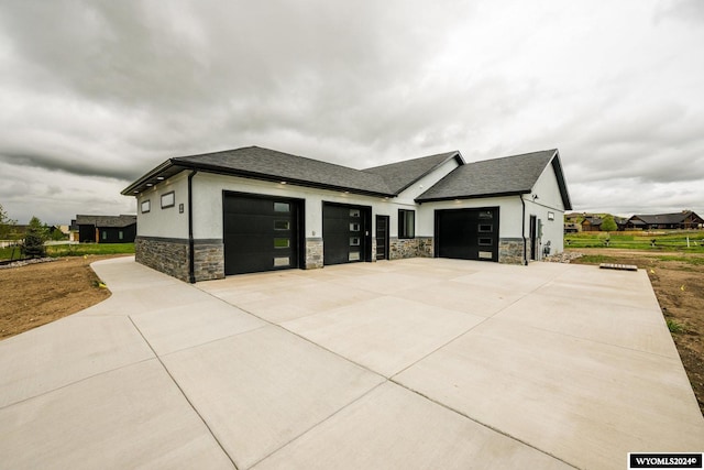 view of side of property with a garage