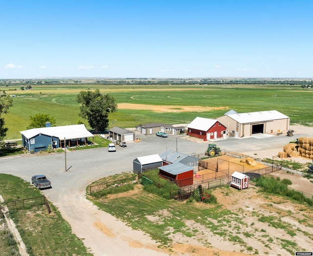 birds eye view of property featuring a rural view