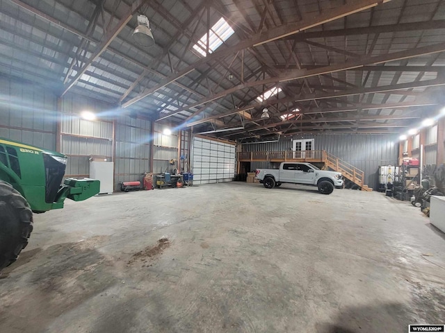 garage featuring white fridge