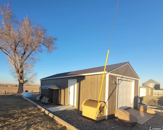 view of outdoor structure with a garage