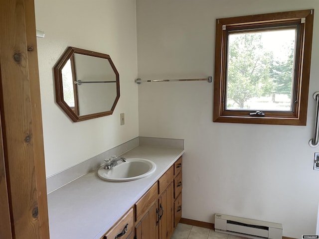 bathroom with vanity, tile patterned floors, and a baseboard heating unit