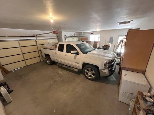 garage with a garage door opener