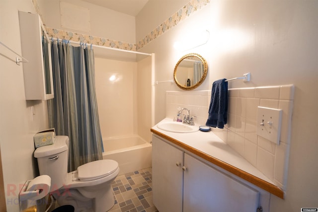 full bathroom with decorative backsplash, toilet, shower / bathtub combination with curtain, and vanity