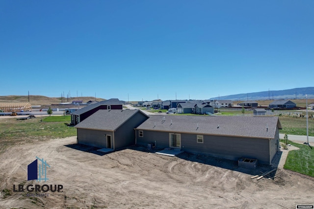 exterior space featuring a mountain view