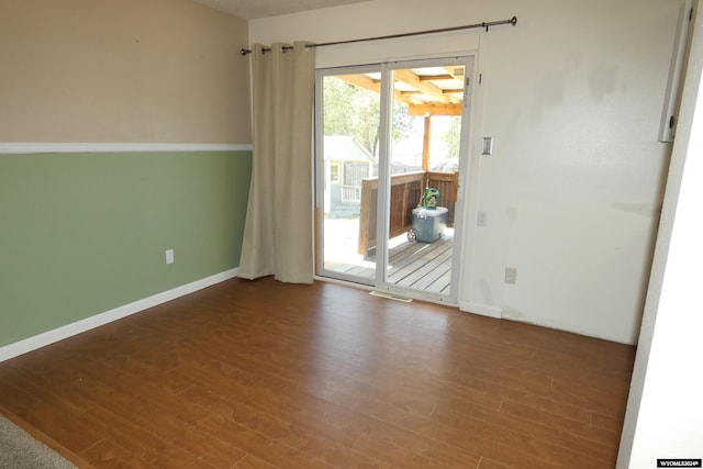 unfurnished room featuring hardwood / wood-style floors