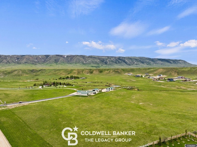 view of mountain feature with a rural view