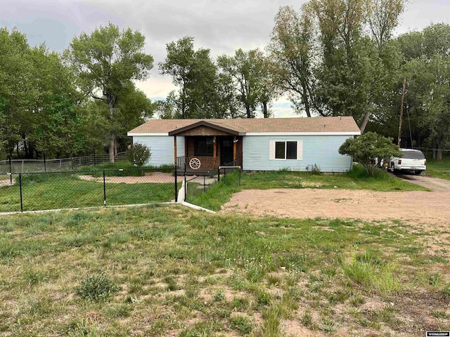 view of front of home with a front yard