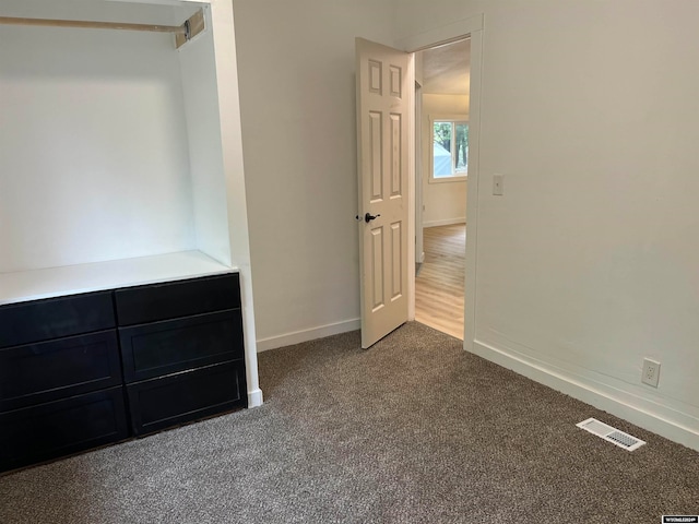 unfurnished bedroom featuring carpet flooring