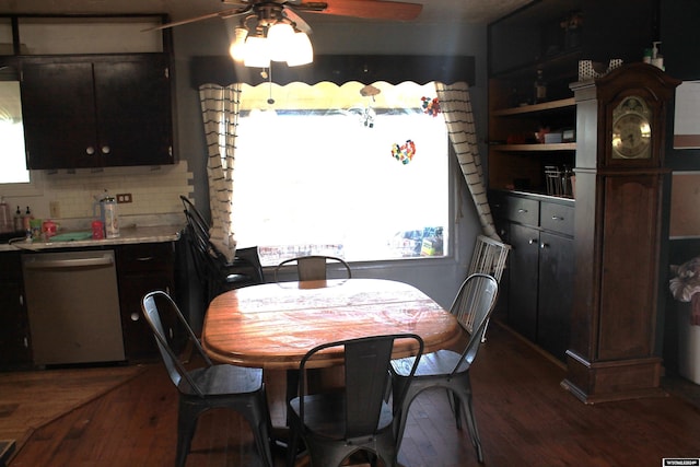 dining area featuring wood-type flooring and ceiling fan