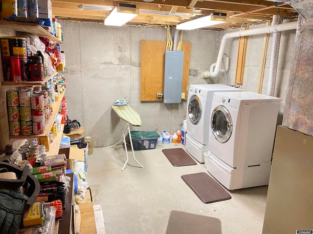 laundry area with independent washer and dryer