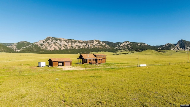 mountain view featuring a rural view