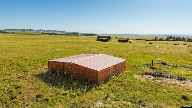 birds eye view of property featuring a rural view