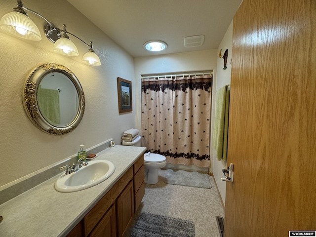 full bathroom featuring vanity, shower / bath combination with curtain, and toilet