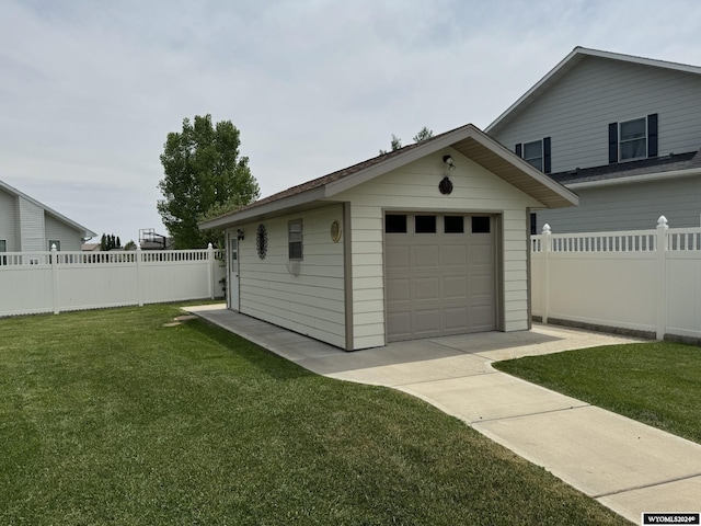 garage with a yard