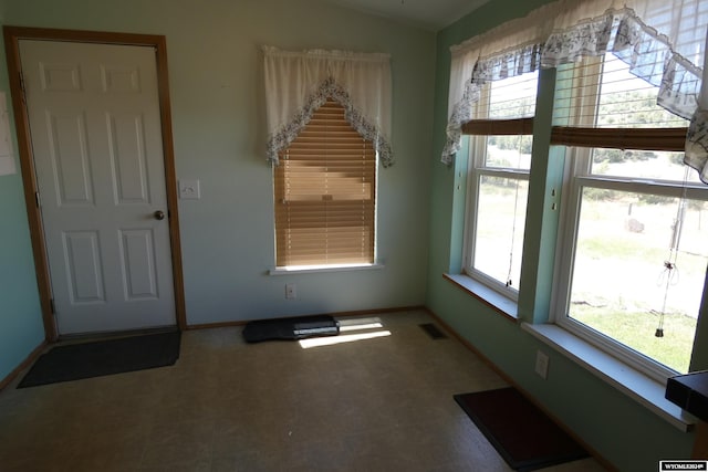 160 Pleasant Valley Rd, Hartville, WY 82215 - spare room featuring vaulted ceiling and a healthy amount of sunlight