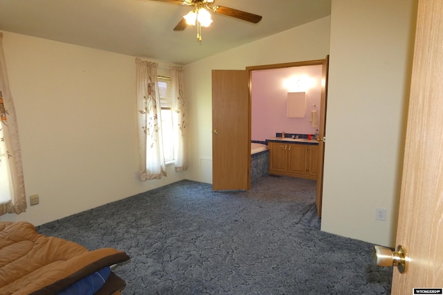 160 Pleasant Valley Rd, Hartville, WY 82215 - unfurnished bedroom with lofted ceiling and dark colored carpet