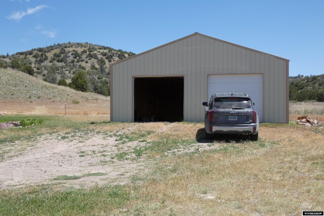 garage featuring a mountain view