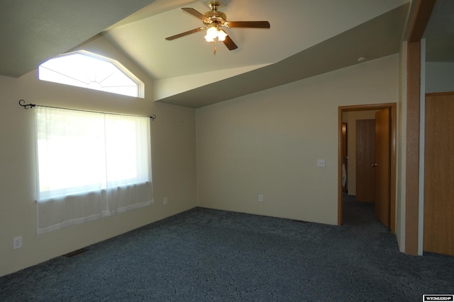 160 Pleasant Valley Rd, Hartville, WY 82215 - unfurnished room featuring dark colored carpet, vaulted ceiling, and ceiling fan