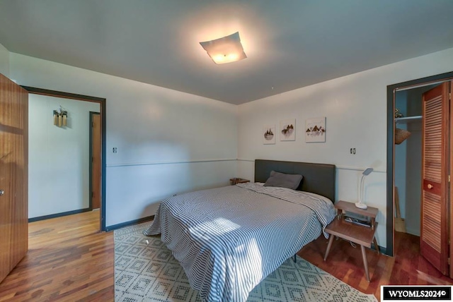 bedroom featuring a closet and hardwood / wood-style floors