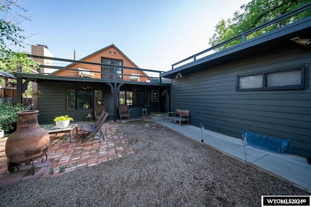 rear view of house with a patio