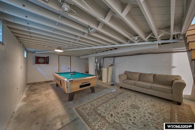 game room with pool table and concrete flooring