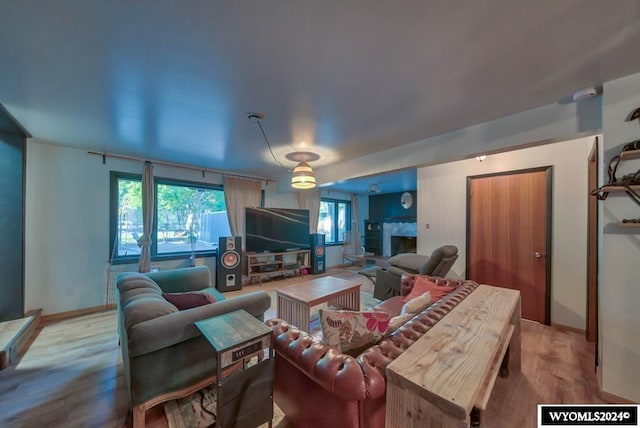 living room with light hardwood / wood-style floors