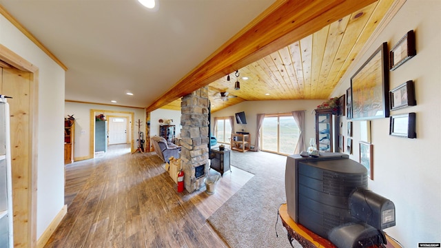 living room with wooden ceiling, wood-type flooring, crown molding, and vaulted ceiling