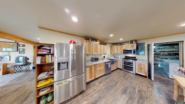 kitchen featuring light brown cabinets, light stone counters, dark hardwood / wood-style flooring, stainless steel appliances, and sink