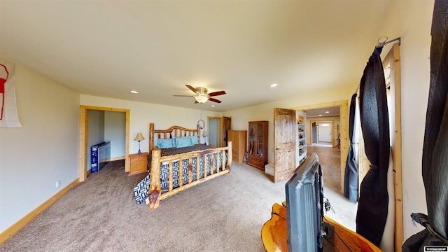 carpeted bedroom featuring ceiling fan