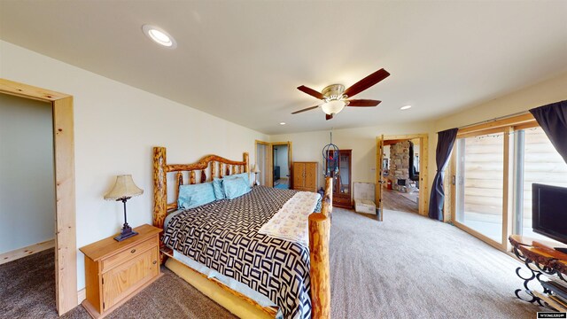 carpeted bedroom featuring access to exterior and ceiling fan