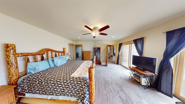 carpeted bedroom featuring access to exterior and ceiling fan