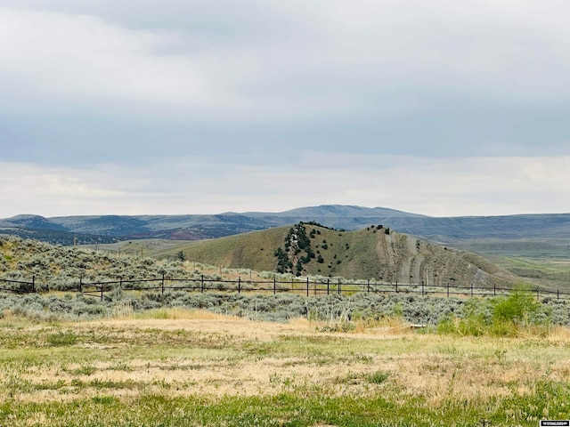 view of mountain feature featuring a rural view