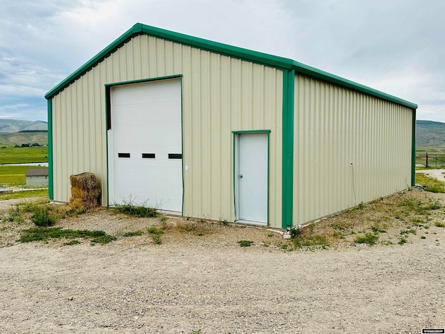 view of outbuilding with a garage