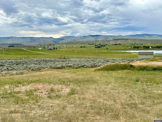 property view of mountains featuring a rural view