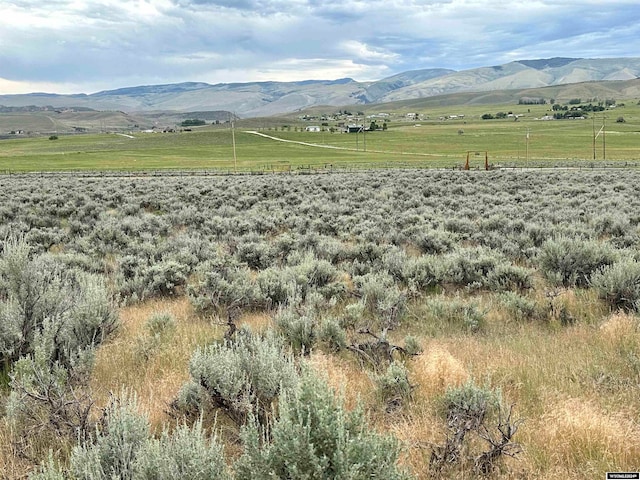 property view of mountains featuring a rural view