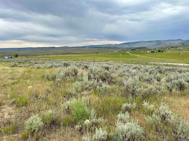 property view of mountains featuring a rural view