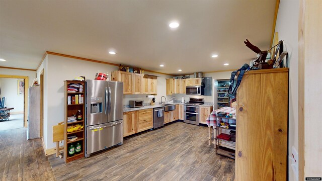 kitchen featuring light brown cabinetry, stainless steel appliances, dark hardwood / wood-style flooring, crown molding, and sink