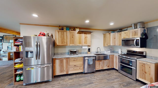 kitchen with sink, dark hardwood / wood-style flooring, light brown cabinets, and stainless steel appliances