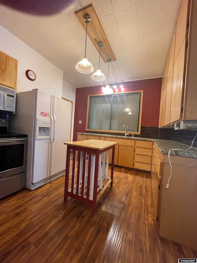 kitchen featuring white appliances, light brown cabinets, pendant lighting, decorative backsplash, and dark hardwood / wood-style flooring