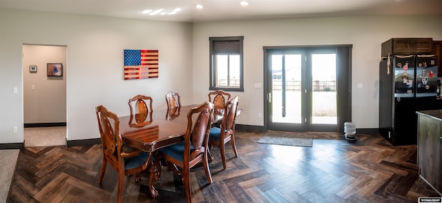 dining space featuring recessed lighting, french doors, and baseboards