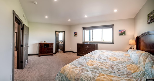 bedroom with recessed lighting, baseboards, and carpet flooring