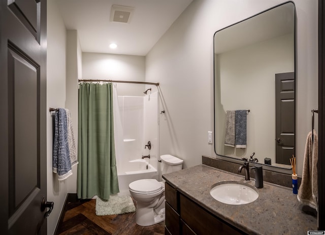 full bathroom with toilet, vanity, and shower / bath combo