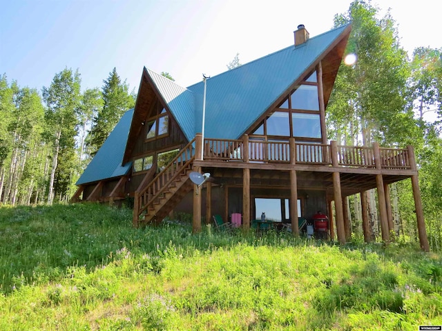 rear view of house with a deck