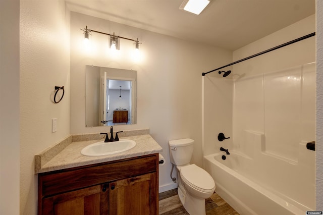 744 E Loucks St, Sheridan, WY 82801 - full bathroom with hardwood / wood-style flooring, toilet, shower / tub combination, and vanity