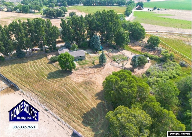 birds eye view of property featuring a rural view