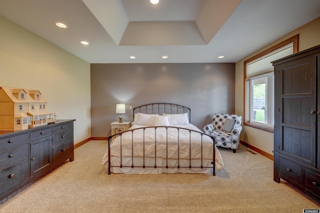 bedroom featuring recessed lighting, light colored carpet, and baseboards