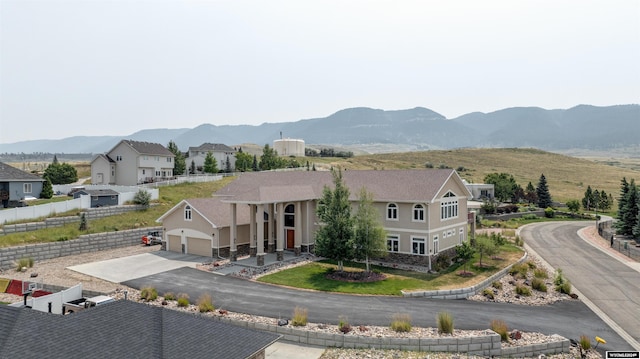 property view of mountains featuring a residential view