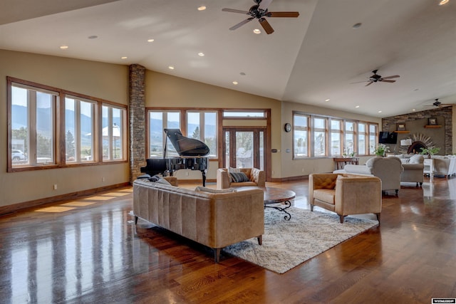 living area featuring baseboards, dark wood finished floors, a ceiling fan, high vaulted ceiling, and recessed lighting