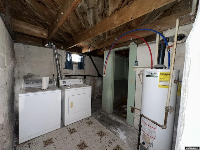 laundry room with separate washer and dryer and gas water heater