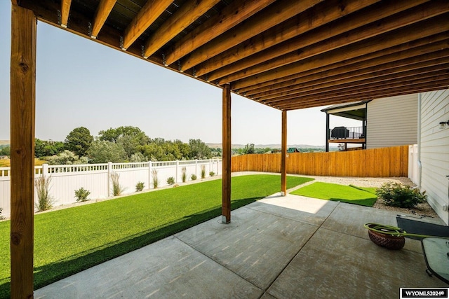 view of patio with a fenced backyard